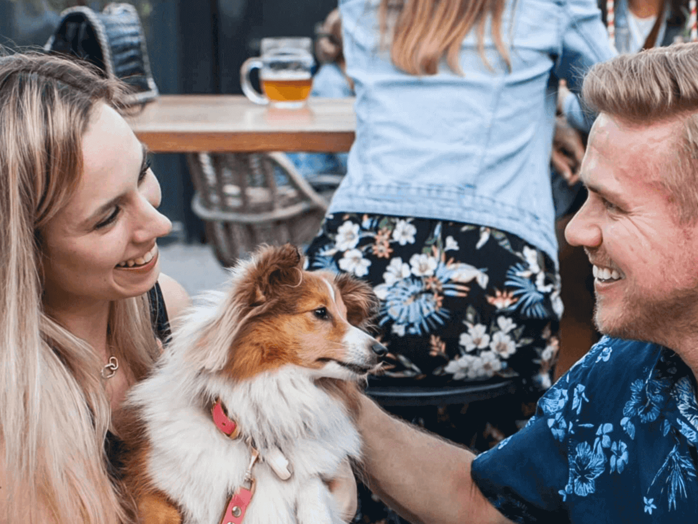 A couple with a dog at Manifesto market