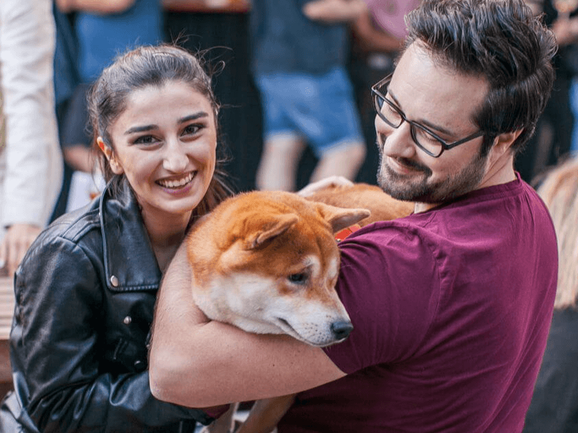 A couple with a dog at Manifesto Market